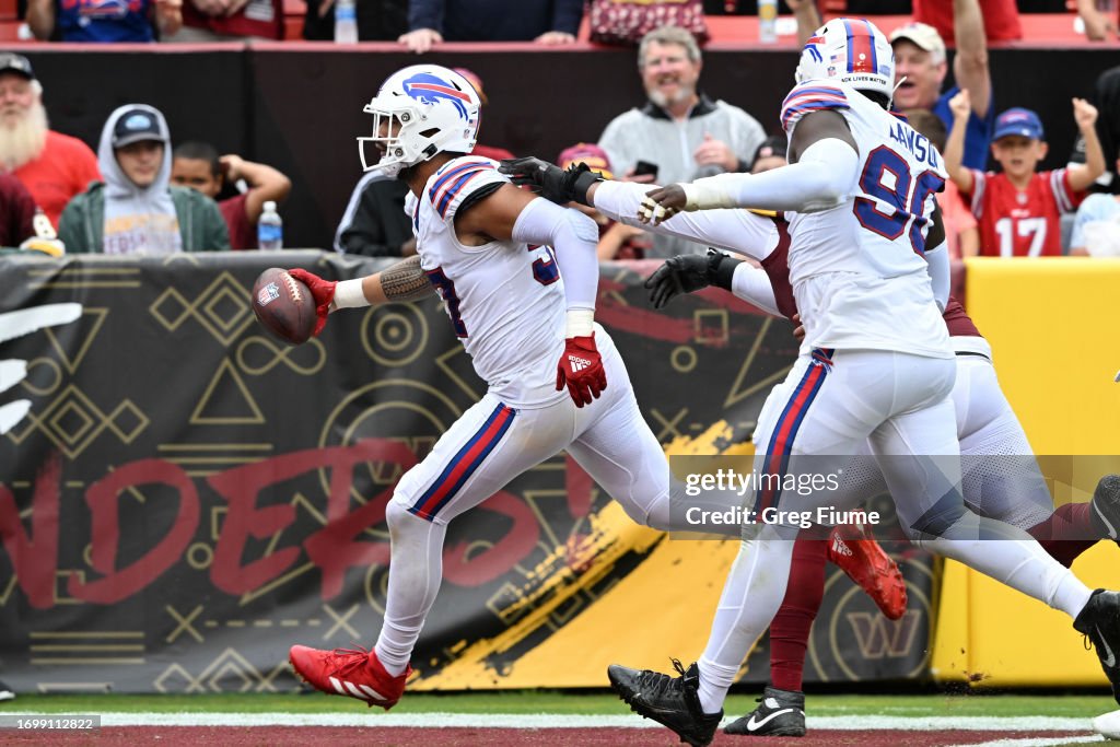 Commanders Interception AJ Epenesa of the Buffalo Bills returns an interception for a... News ...
