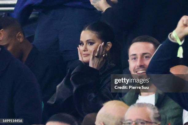 Selena Gomez is seen during the Ligue 1 Uber Eats match between Paris Saint-Germain and Olympique de Marseille at Parc des Princes on September 24,...