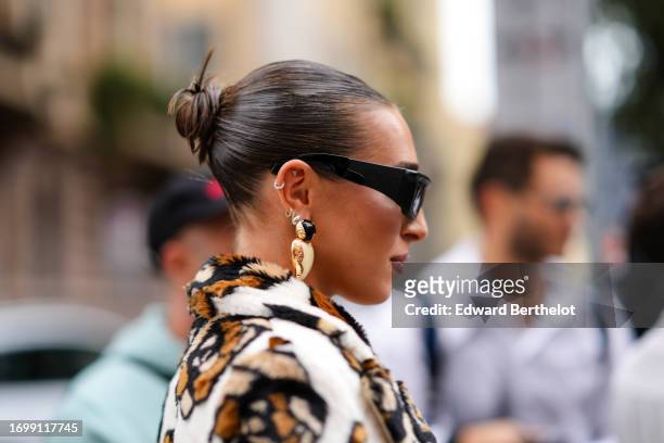 Ginevra Mavilla wears sunglasses, earrings , outside Missoni, during the Milan Fashion Week - Womenswear Spring/Summer 2024 on September 23, 2023 in...