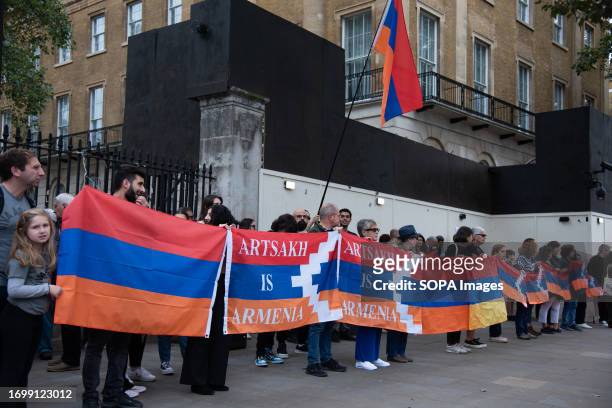 Protestors hold large banners during the Pro-Nagorno-Karabakh Protest The purpose of the campaign is to denounce Azerbaijan's reintegration of...