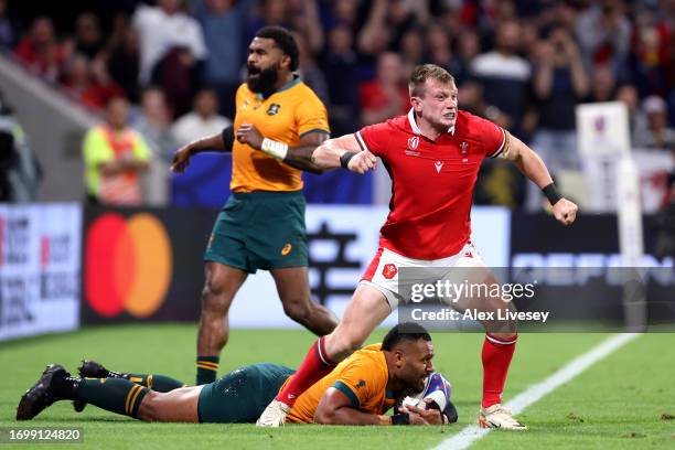 Nick Tompkins of Wales celebrates scoring his team's second try during the Rugby World Cup France 2023 match between Wales and Australia at Parc...