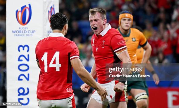 Nick Tompkins of Wales celebrates with Louis Rees-Zammit of Wales after scoring his team's second try during the Rugby World Cup France 2023 match...