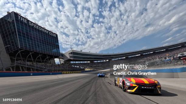 Bubba Wallace, driver of the McDonald's Toyota, leads the field on a pace lap prior to the NASCAR Cup Series Autotrader EchoPark Automotive 400 at...