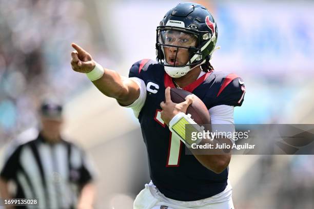 Stroud of the Houston Texans scrambles during the first half in the game against the Jacksonville Jaguars at EverBank Stadium on September 24, 2023...
