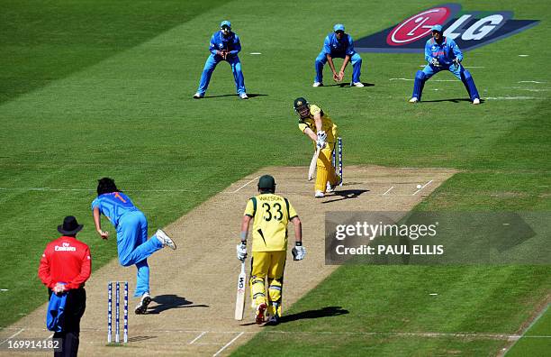 India's Ishant Sharma sends down a delivery to Australia's Adam Voges during the warm-up cricket match ahead of the 2013 ICC Champions Trophy between...