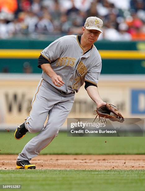 Third baseman Brandon Inge of the Pittsburgh Pirates fields a grounder hit by Victor Martinez of the Detroit Tigers in the second inning of an...