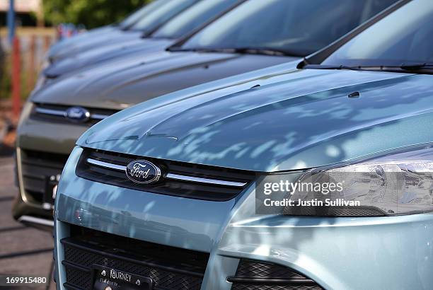 Brand new Ford Escape SUVs are displayed on the sales lot at Journey Ford on June 4, 2013 in Novato, California. Ford announced the recall of over...