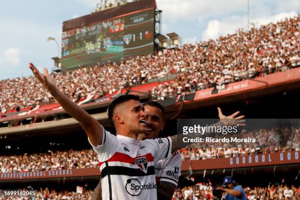 Rodrigo Nestor of Sao Paulo celebrates with a teammate after scoring the first goal of their team during the second leg of Copa Do Brasil 2023 final...
