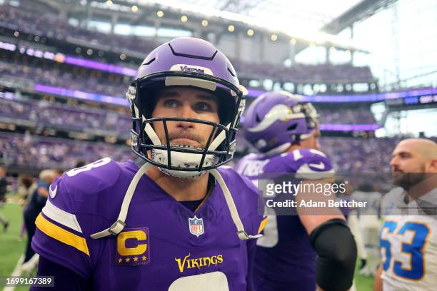 Kirk Cousins of the Minnesota Vikings looks on after his team's 28-24 loss against the Los Angeles Chargers at U.S. Bank Stadium on September 24,...