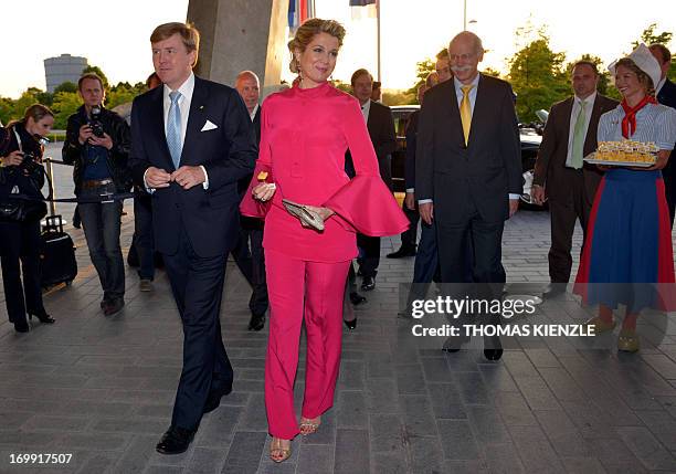 King Willem-Alexander and Queen Maxima of the Netherlands and CEO of Daimler AG Dieter Zetsche arrive at the Mercedes-Benz museum in Stuttgart,...