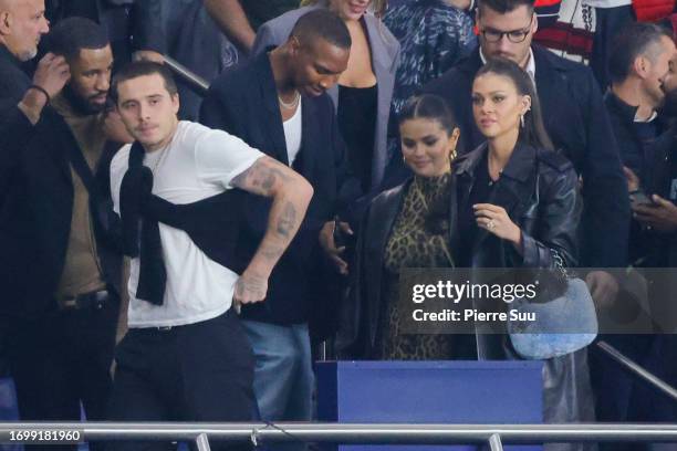 Selena Gomez ,Brooklyn Beckham and Nicola Peltz are seen during the Ligue 1 Uber Eats match between Paris Saint-Germain and Olympique de Marseille at...