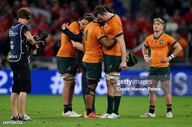 Rob Valetini and Nick Frost of Australia look dejected as they embrace at full-time following the Rugby World Cup France 2023 match between Wales and...