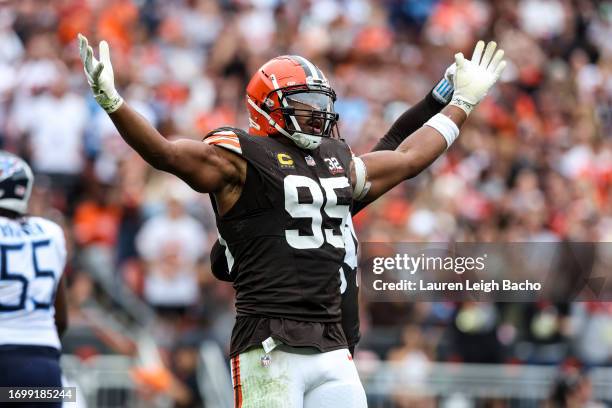 Myles Garrett of the Cleveland Browns celebrates after sacking Ryan Tannehill of the Tennessee Titans during the game at Cleveland Browns Stadium on...