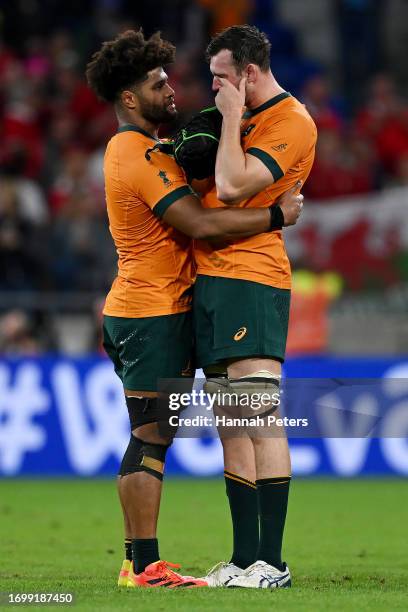 Rob Valetini consoles Nick Frost of Australia at full-time following the Rugby World Cup France 2023 match between Wales and Australia at Parc...