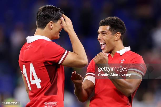Louis Rees-Zammit and Rio Dyer of Wales celebrate victory at full-time following the Rugby World Cup France 2023 match between Wales and Australia at...