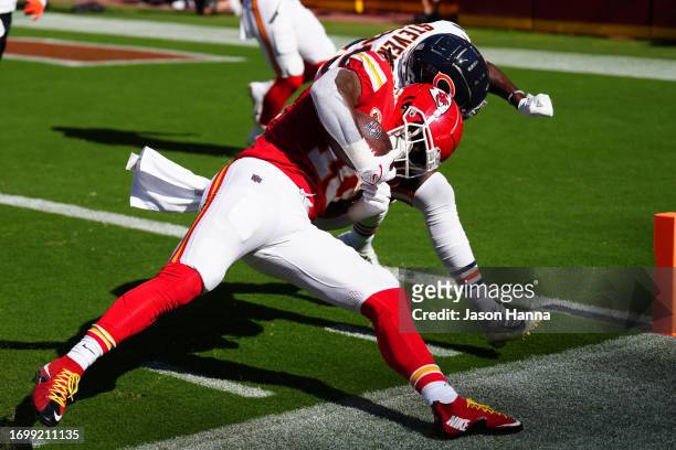 Isiah Pacheco of the Kansas City Chiefs is forced out of bounds near the end zone in the first half of a game against the Chicago Bears at GEHA Field...