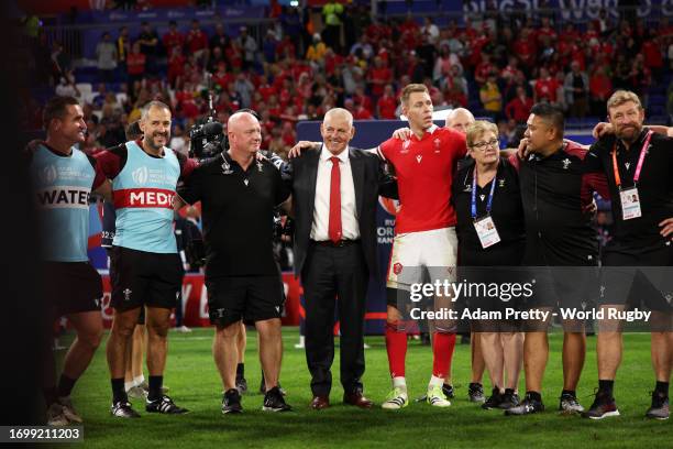 The players and staff members of Wales form a huddle at full-time following the Rugby World Cup France 2023 match between Wales and Australia at Parc...