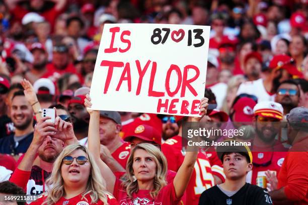 Fan Taylor swift holds u a sign during a game between the Chicago Bears and the Kansas City Chiefs at GEHA Field at Arrowhead Stadium on September...