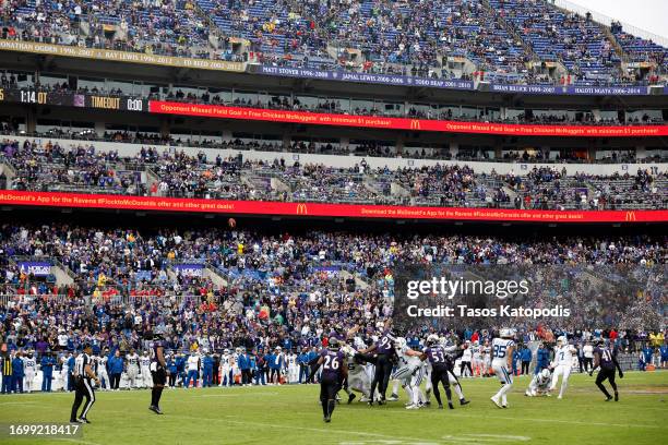 Matt Gay of the Indianapolis Colts kicks a field goal in overtime against the Baltimore Ravens at M&T Bank Stadium on September 24, 2023 in...