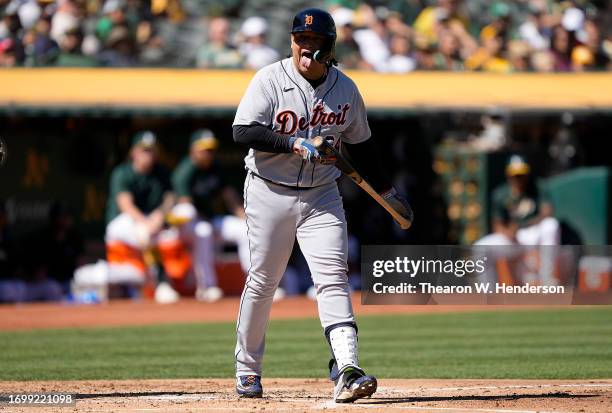 Miguel Cabrera of the Detroit Tigers reacts after taking ball four drawing a walk to load the bases against the Oakland Athletics in the top of the...