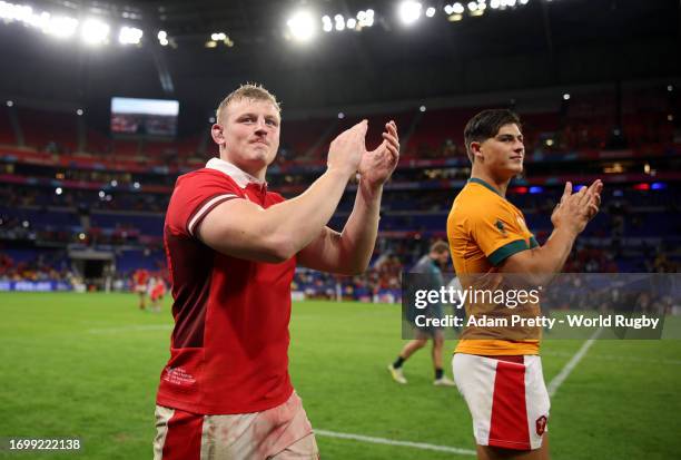 Jac Morgan and Louis Rees-Zammit of Wales applaud the fans at full-time following the Rugby World Cup France 2023 match between Wales and Australia...