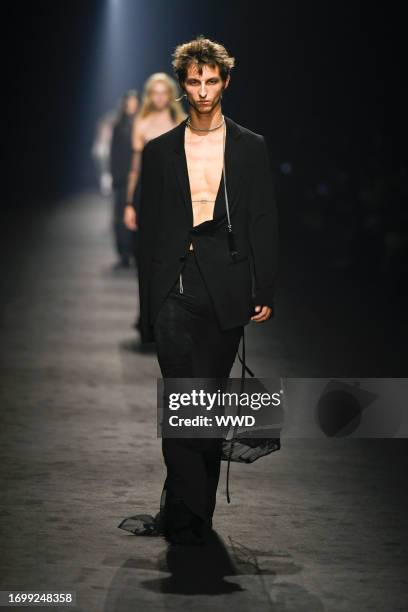 Model on the runway at Ann Demeulemeester Ready To Wear Spring 2024 on September 30, 2023 in Paris, France.