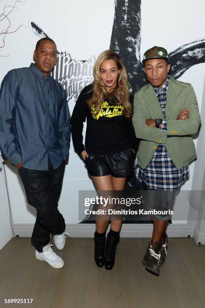 Jay-Z, Beyoncé and Pharrell Williams attend the 10th anniversary party of Billionaire Boys Club presented by HTC at Tribeca Canvas on June 4, 2013 in...