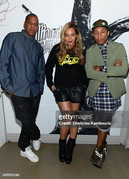 Jay-Z, Beyoncé and Pharrell Williams attend the 10th anniversary party of Billionaire Boys Club presented by HTC at Tribeca Canvas on June 4, 2013 in...