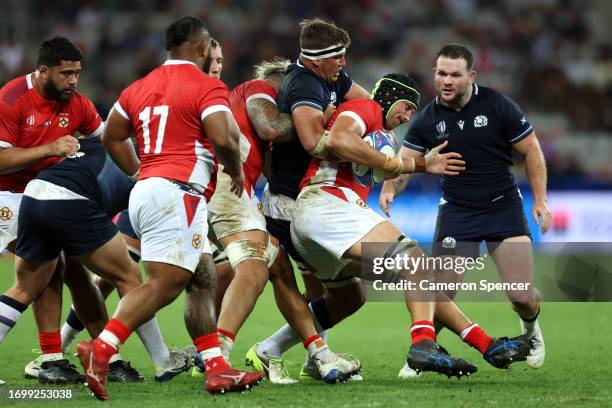 Adam Coleman of Tonga is tackled by Sam Skinner of Scotland during the Rugby World Cup France 2023 match between Scotland and Tonga at Stade de Nice...