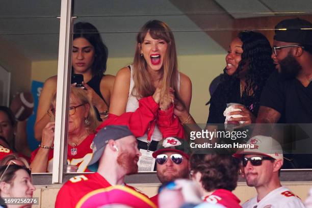 Taylor Swift reacts during the first half of a game between the Chicago Bears and the Kansas City Chiefs at GEHA Field at Arrowhead Stadium on...