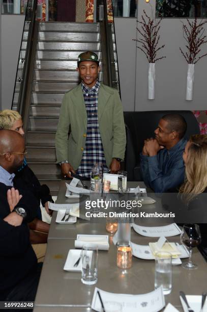 Pharrell Williams speaks to guests including Jay-Z and Beyonce at the 10th anniversary party of Billionaire Boys Club presented by HTC at Tribeca...