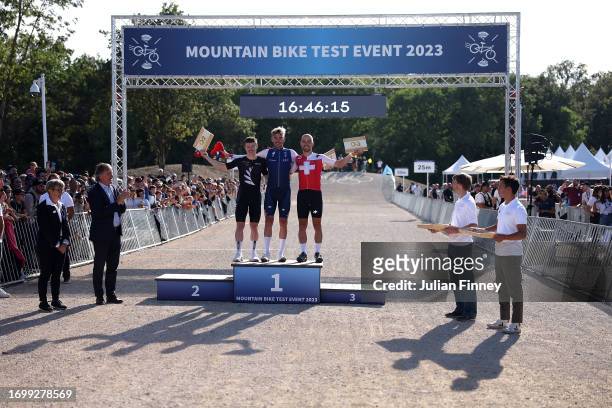 Victor Koretzky of France celebrates coming first in the Men's Cross-country Mountain Bike event during the Paris 2024 Mountain Bike test event at...
