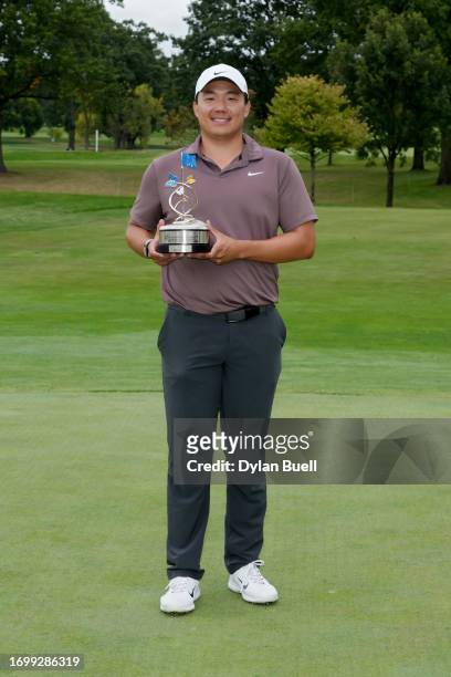 Norman Xiong of the United States poses with the trophy after winning the Nationwide Children's Hospital Championship at Ohio State University Golf...