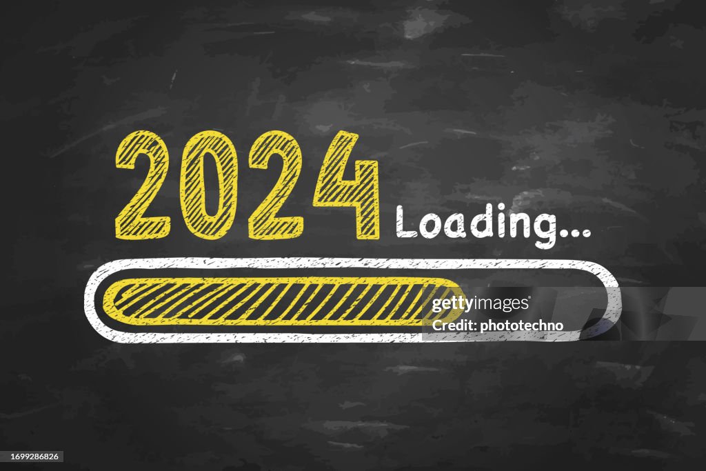 Chargement du Nouvel An 2024 sur le tableau noir