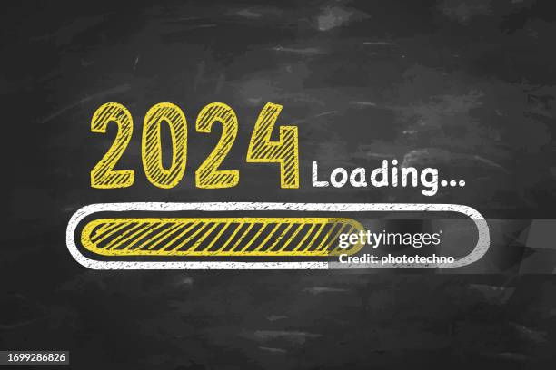 loading new year 2024 on chalkboard background - new years resolution stock illustrations
