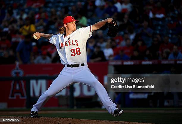 Jered Weaver of the Los Angeles Angels of Anaheim pitches against the Chicago Cubs at Angel Stadium of Anaheim on June 4, 2013 in Anaheim, California.