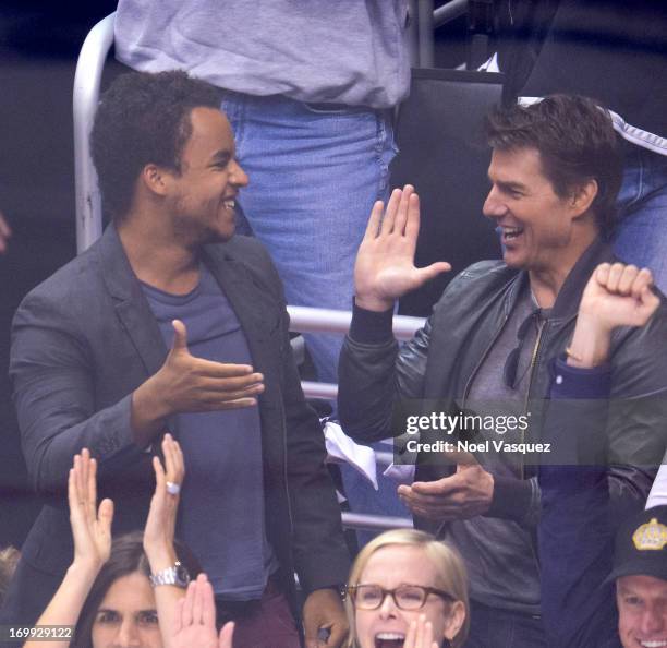 Connor Cruise and Tom Cruise attend an NHL playoff game between the Chicago Blackhawks and the Los Angeles Kings at Staples Center on June 4, 2013 in...