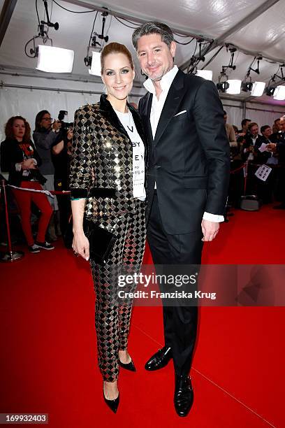 Judith Rakers and Andreas Pfaff attend the Studio Hamburg Nachwuchspreis 2013 at Thalia Theater on June 4, 2013 in Hamburg, Germany.