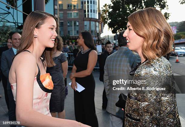 Actress Katie Chang and director Sofia Coppola arrive to the Los Angeles premiere of A24's "The Bling Ring" at the Directors Guild Theater on June 4,...