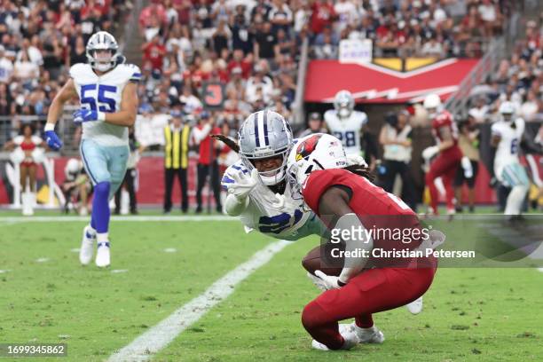 Marquise Brown of the Arizona Cardinals catches a pass for a touchdown during the fourth quarter of a game against the Dallas Cowboys at State Farm...