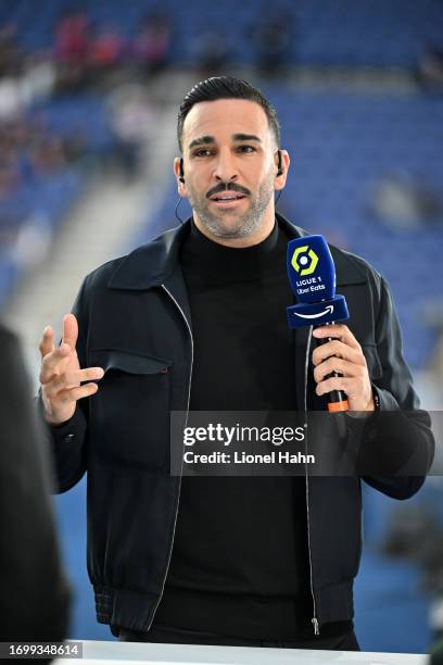 Former football player Adil Rami before Ligue 1 Uber Eats match between Paris Saint-Germain and Olympique de Marseille at Parc des Princes on...