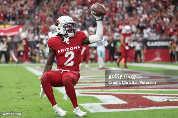 Marquise Brown of the Arizona Cardinals celebrates a touchdown during the fourth quarter of a game against the Dallas Cowboys at State Farm Stadium...