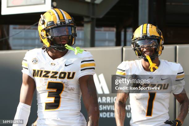 Missouri Tigers wide receiver Luther Burden III and Missouri Tigers wide receiver Theo Wease Jr. Look into he stands after a touchdown during a game...