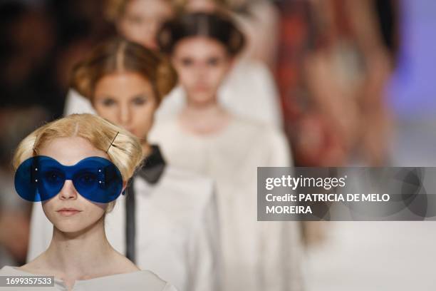 Models display Spring/Summer 2011 creations by Portuguese designer Alexandra Moura during the 35th Edition of Moda Lisboa at Mercado da Ribeira in...