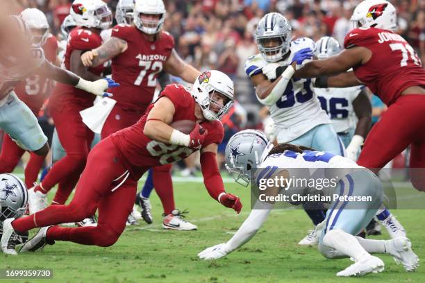 Zach Ertz of the Arizona Cardinals runs the ball during the fourth quarter against the Dallas Cowboys at State Farm Stadium on September 24, 2023 in...