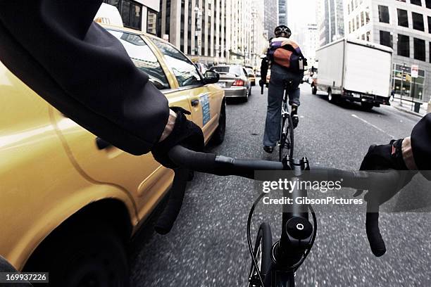 close-up of a bike courier's handle bars in new york city - bike messenger stockfoto's en -beelden