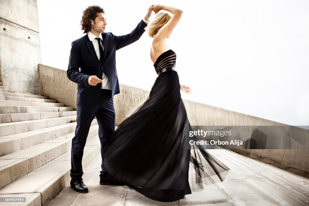 Elegant couple dancing together