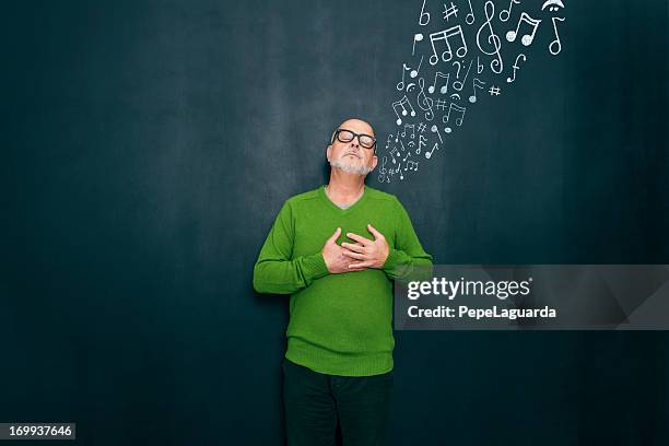 music and emotions - hand on heart stock pictures, royalty-free photos & images