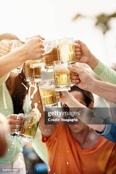 young people at bistro having beer. - sidewalk cafe stock pictures, royalty-free photos & images