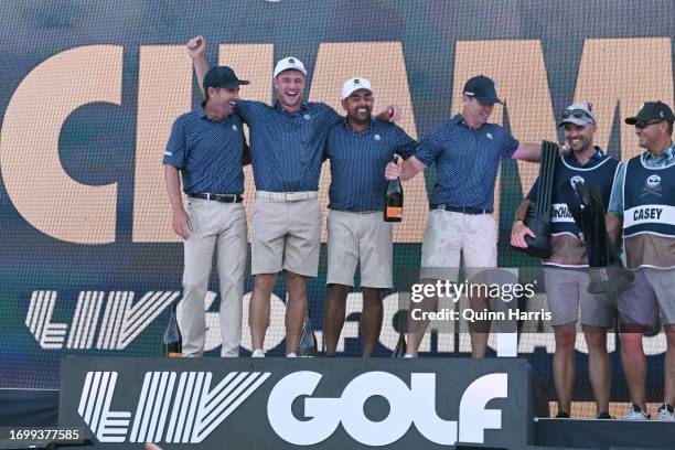 Bryson DeChambeau, Anirban Lahiri, Charles Howell III, and Paul Casey celebrate after the LIV Golf Invitational - Chicago at Rich Harvest Farms on...